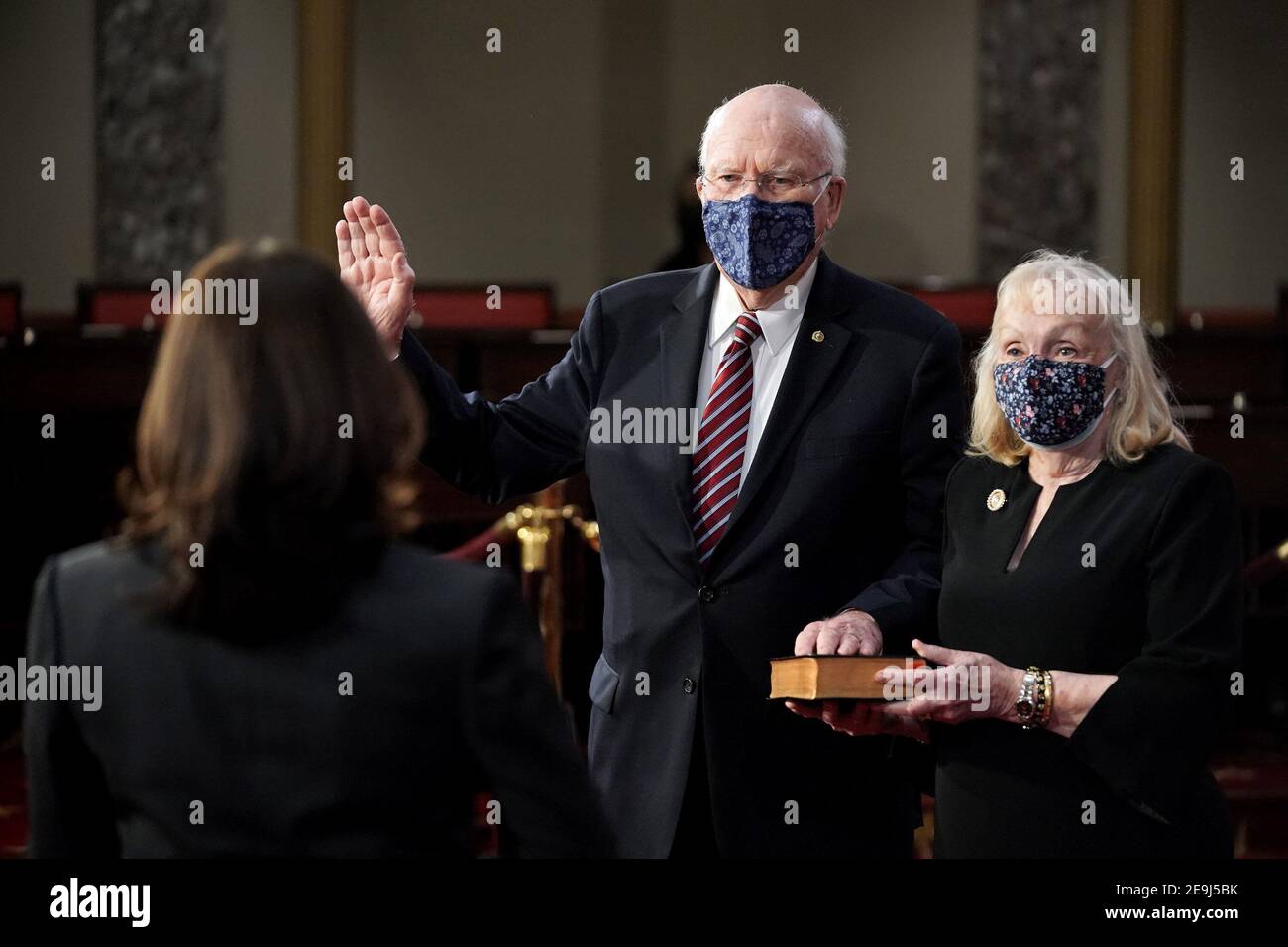 Sen. Patrick Leahy (D-Vt.) participates in a ceremonial swearing in photo op with his wife Marcelle Pomerleau and Vice President Harris on Thursday, February 4, 2021 in the Old Senate Chamber at the U.S. Capitol in Washington, DC.Credit: Greg Nash/Pool via CNP | usage worldwide Stock Photo