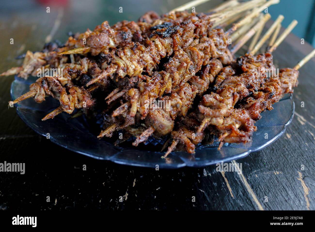 Chicken intestine satay or sate usus ayam. Indonesian traditional food Stock Photo