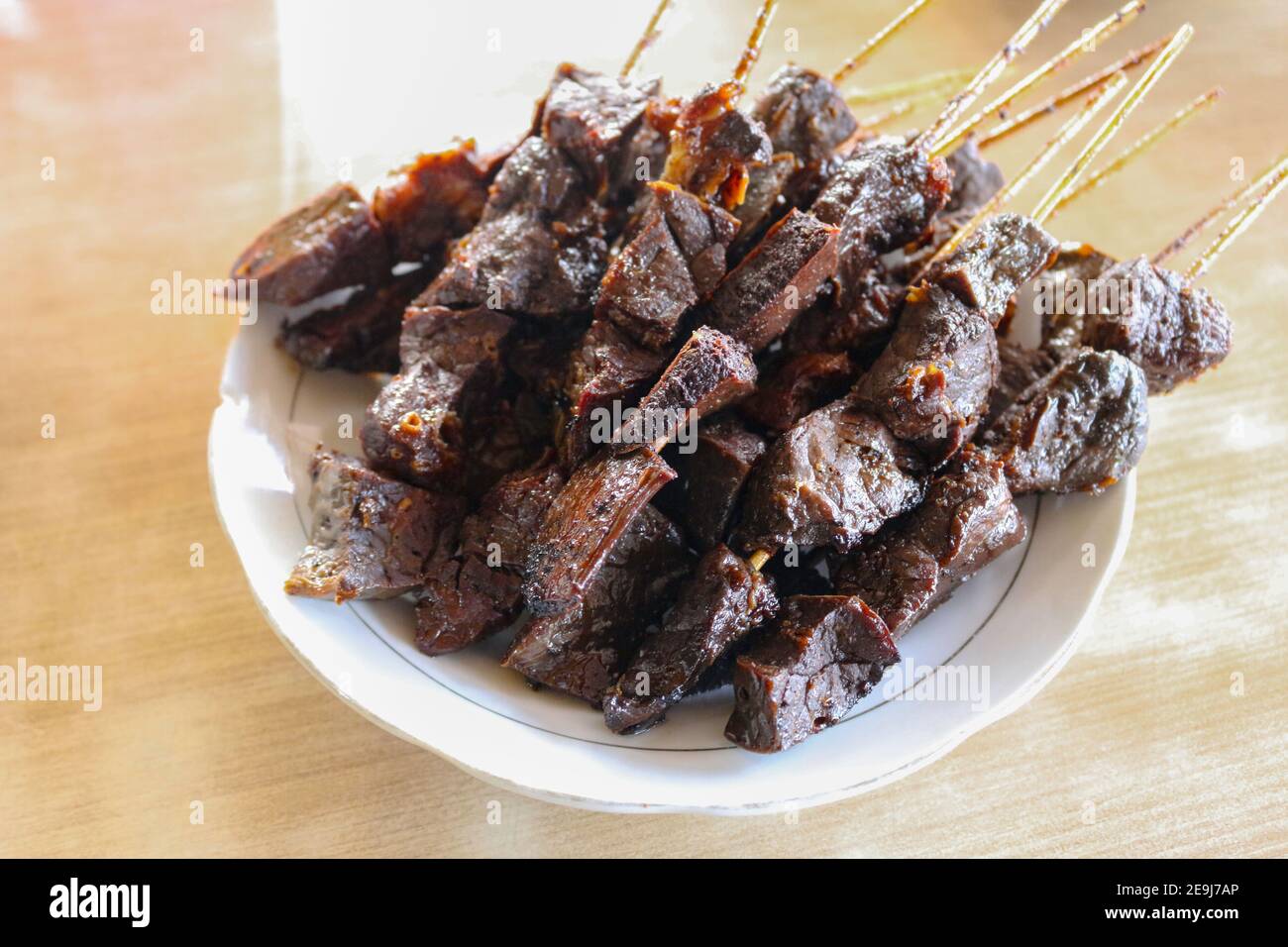 Sate Paru or beef's lung satay with soft texture. Traditional food from Indonesia Stock Photo