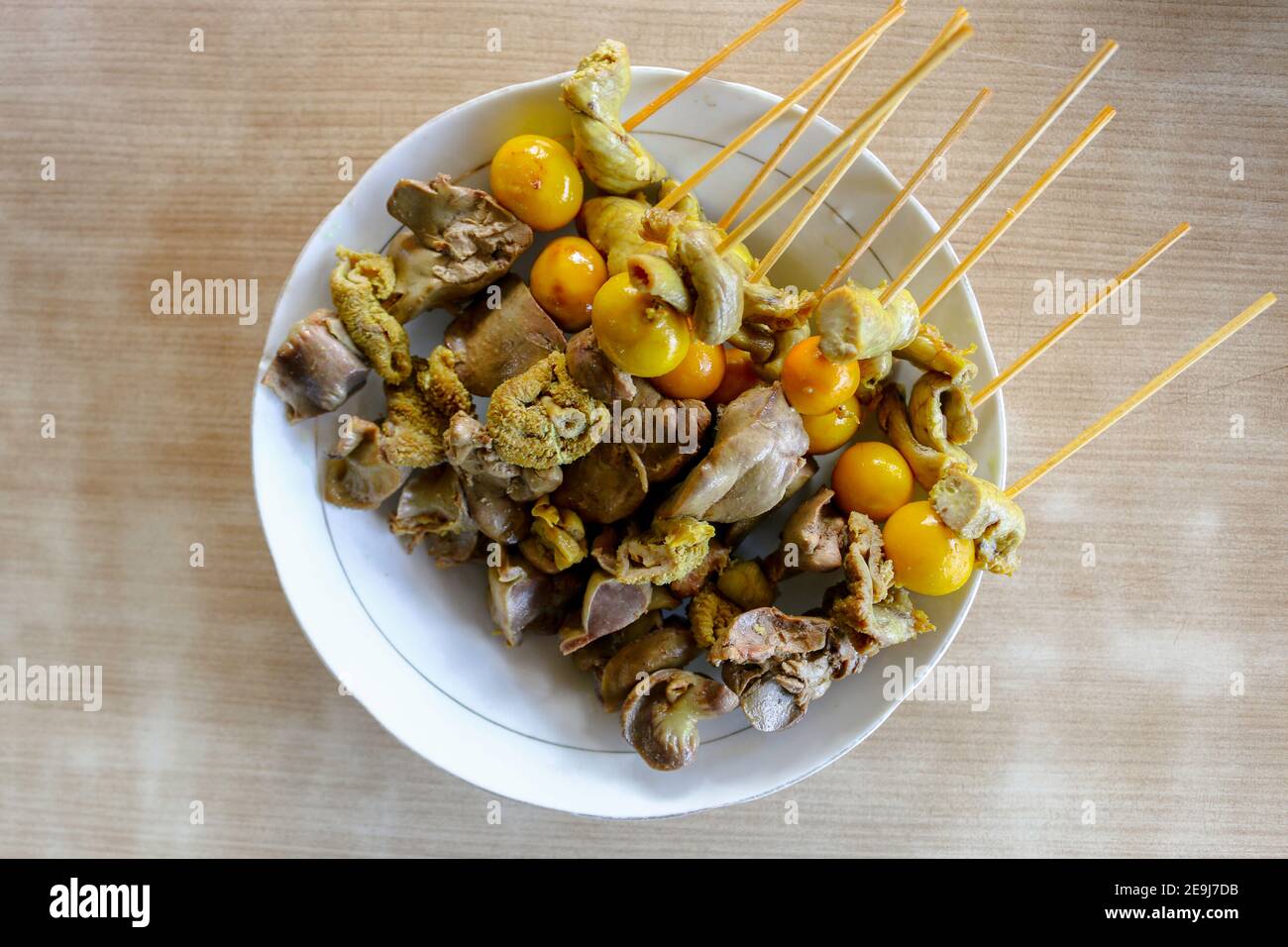 Sate jerohan or innards egg satay. Indonesian traditional food made from eggs and chicken. Stock Photo