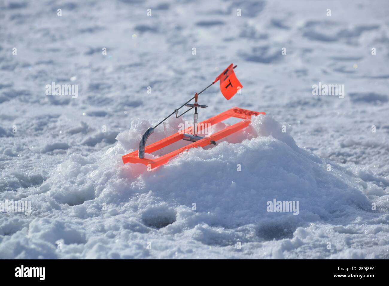 Ice fishing with tip up hi-res stock photography and images - Alamy