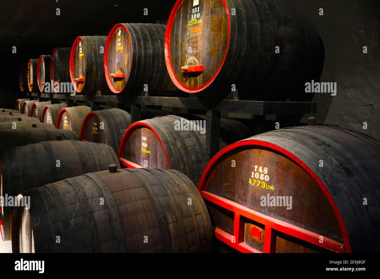 Barrels of wine in the underground cellars of Penfolds Wines at Magill in Adelaide Australia Stock Photo