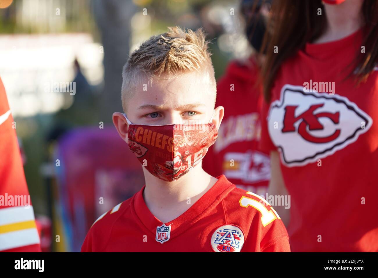 Tampa, Florida, USA, February 4, 2021, Little boy wearing a Kansas City Chiefs Face mask at the Super Bowl Experience  (Photo Credit:  Marty Jean-Louis) Credit: Marty Jean-Louis/Alamy Live News Stock Photo