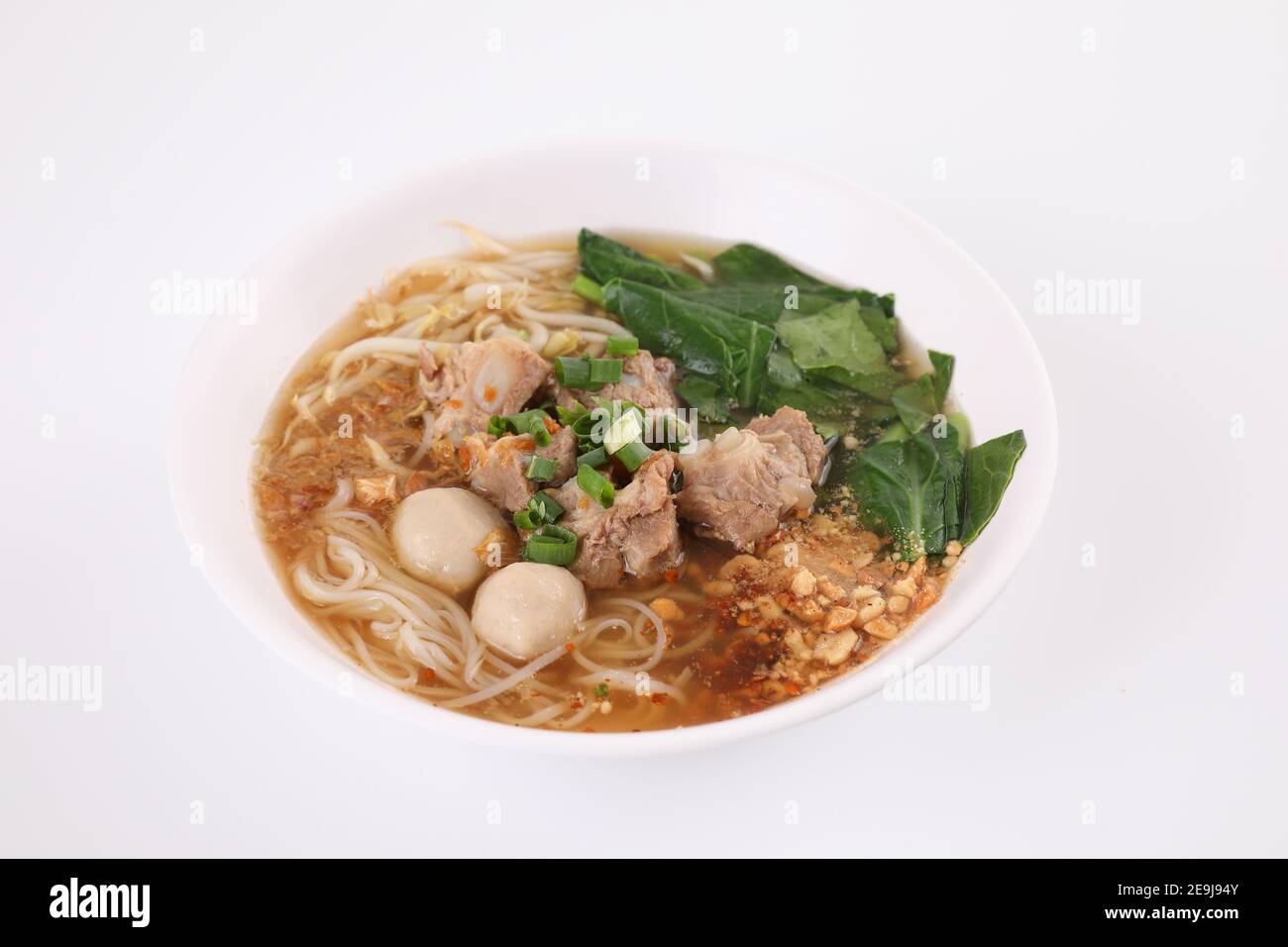 Local Thai food , Noodle with meat ball and pork isolated in white background Stock Photo