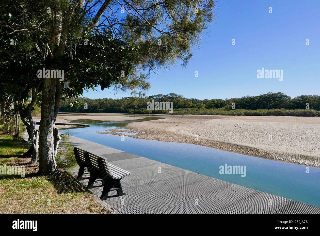 Bench by the river in Coffs Harbour Stock Photo Alamy