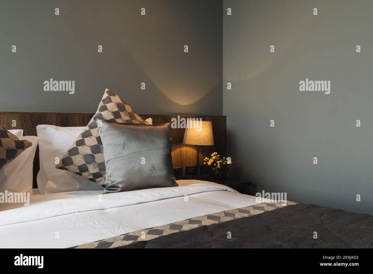 black and grey modern bedroom interior Stock Photo - Alamy