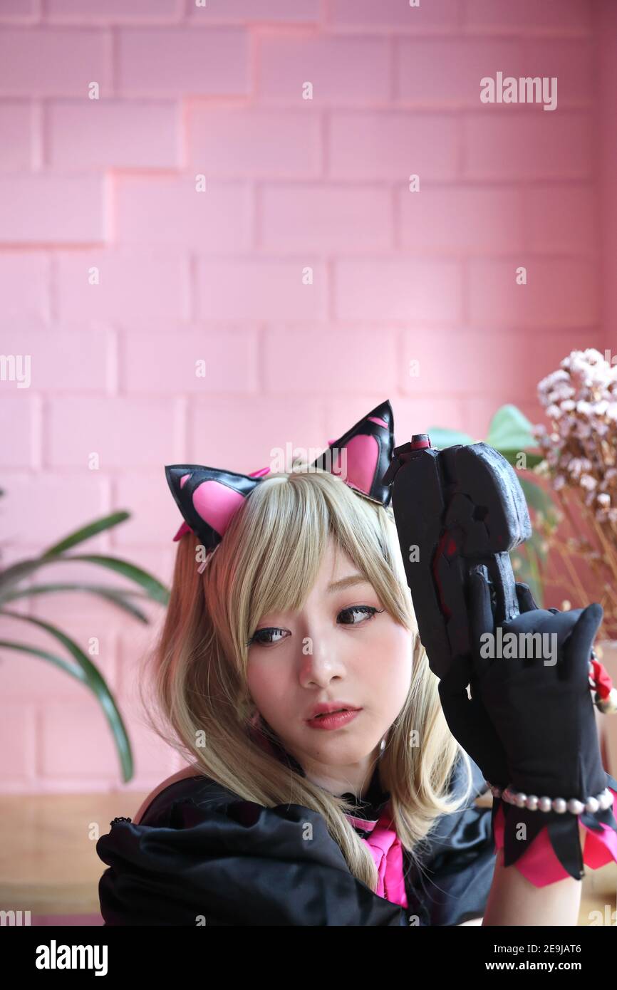 Japan anime cosplay , portrait of girl cosplay in pink room background  Stock Photo - Alamy