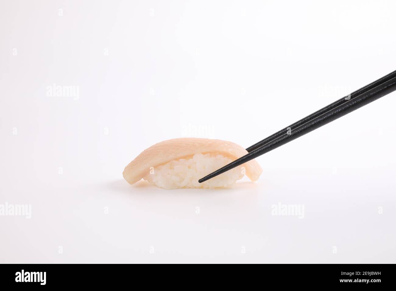 Hamachi sushi , Japanese food yellowtail sushi with chopsticks isolated