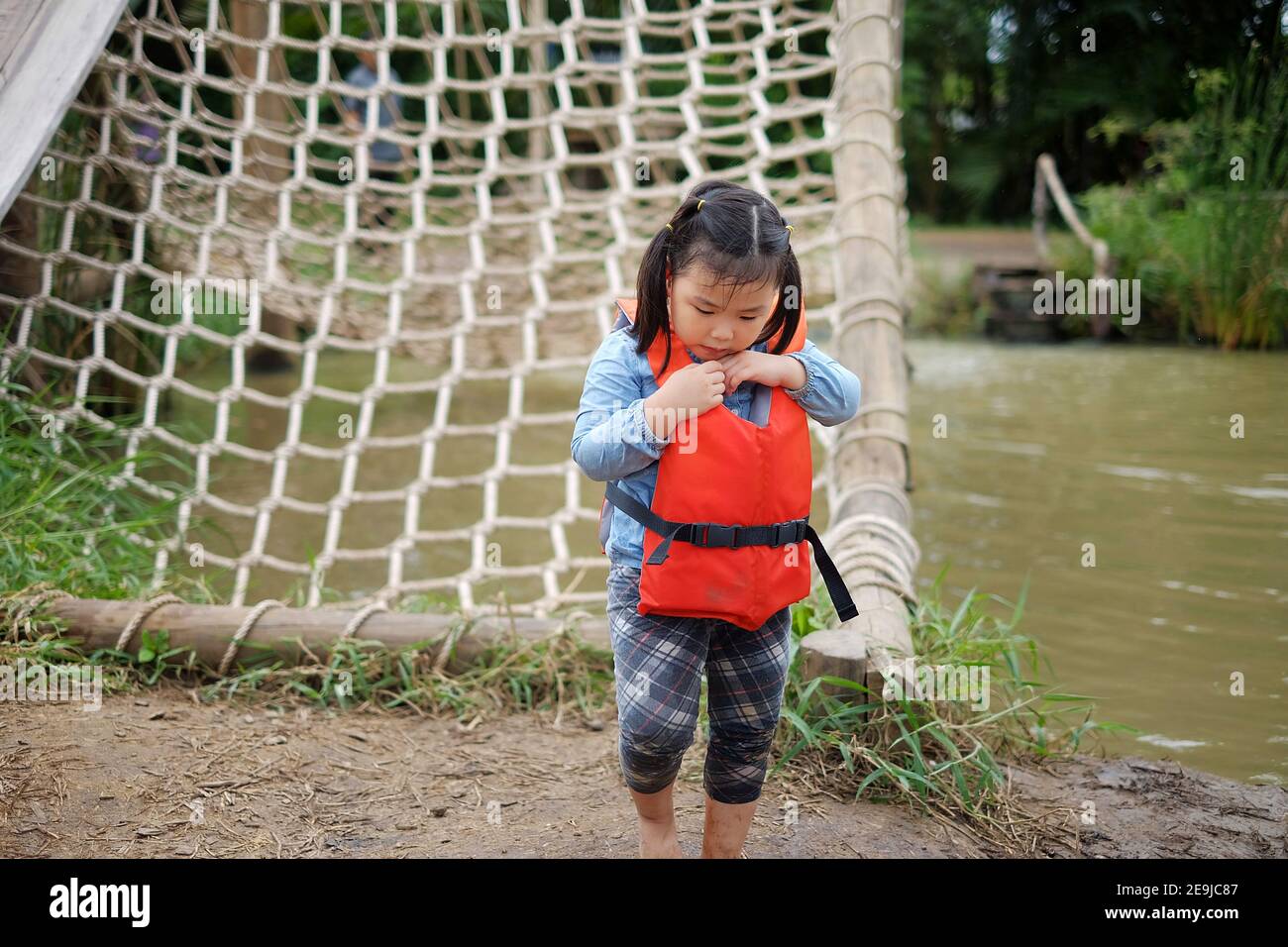 Child wearing life jacket hi-res stock photography and images - Alamy