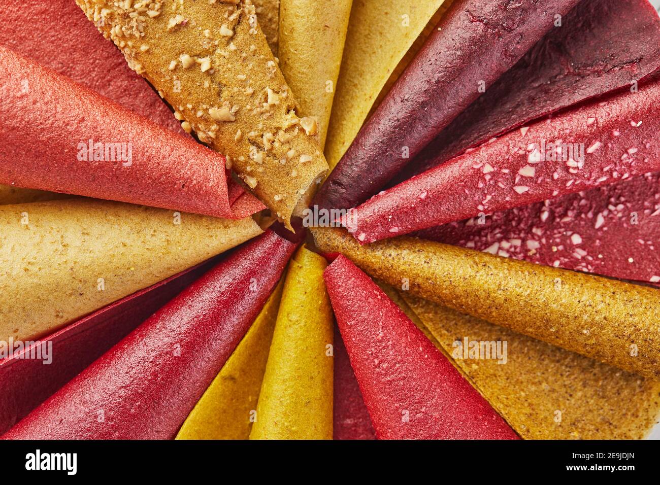 Sweet pure fruit pastille in rolls. Healthy sweets lozenges, fruit