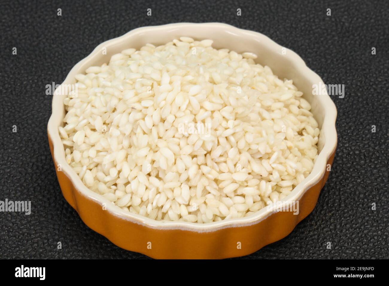 Raw Arborio rice for Italian risotto Stock Photo Alamy