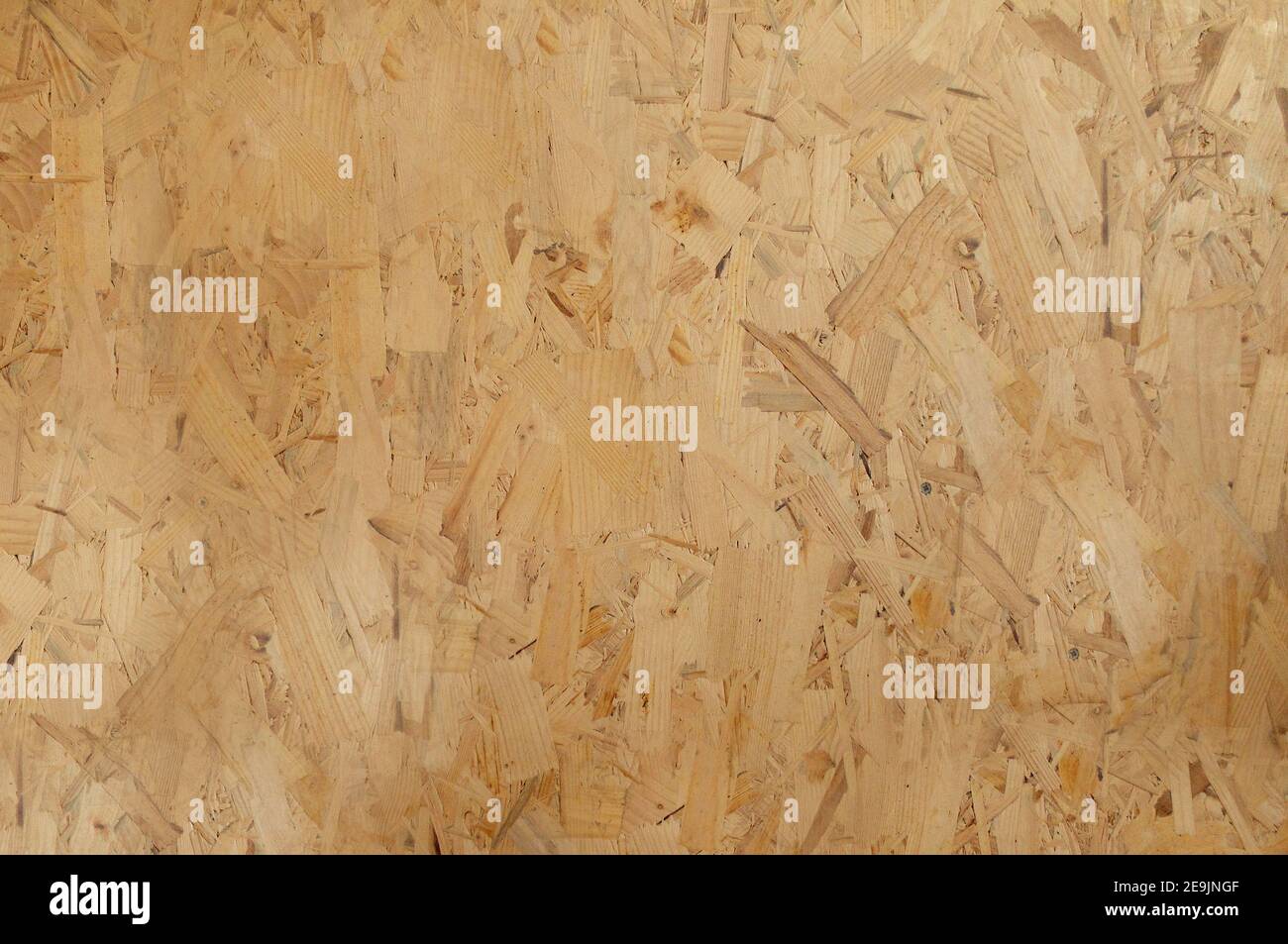 Pressed plywood made from pressed sawdust close up.Texture or