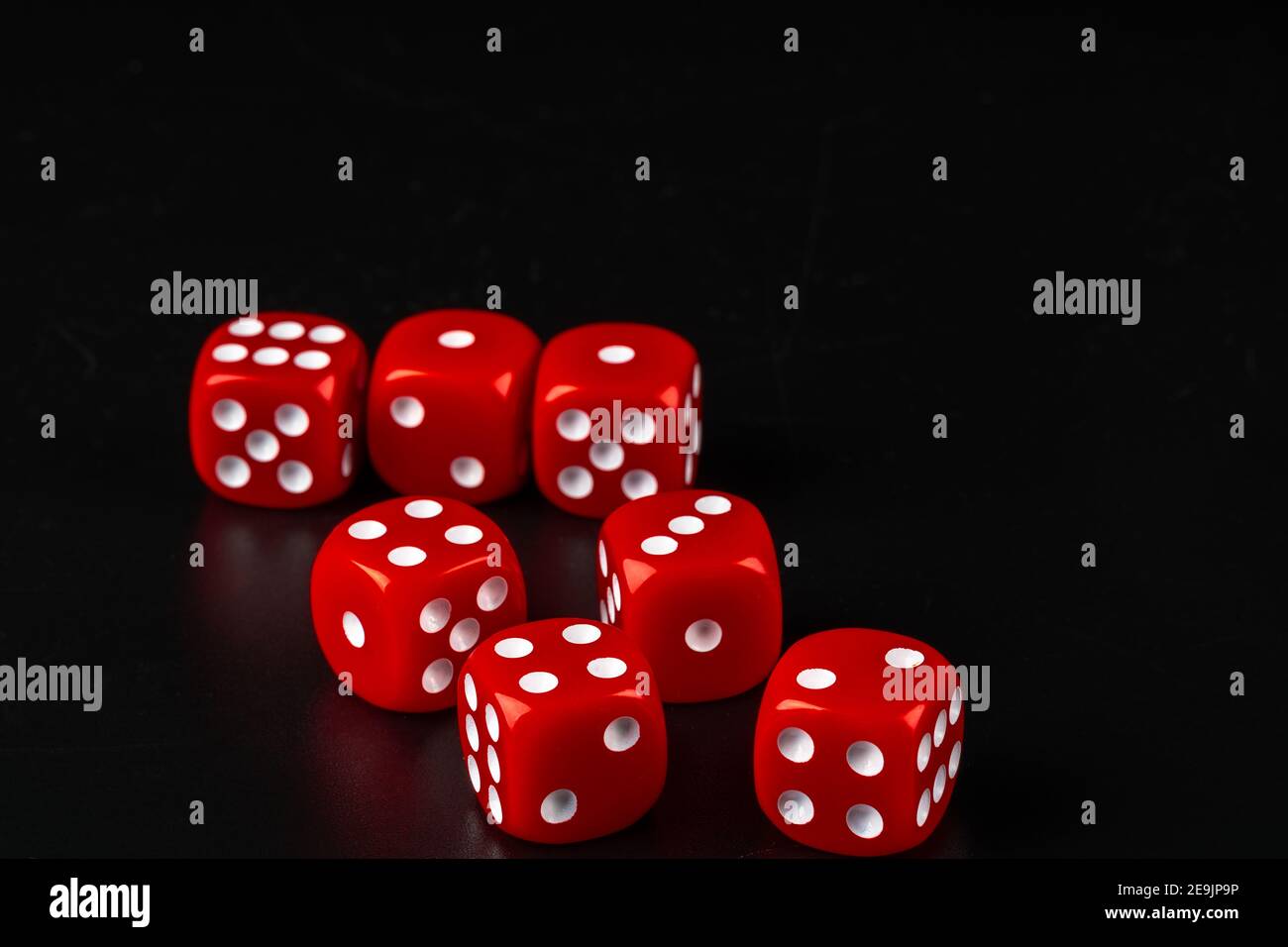 Group of dice close up on dark black background Stock Photo Alamy