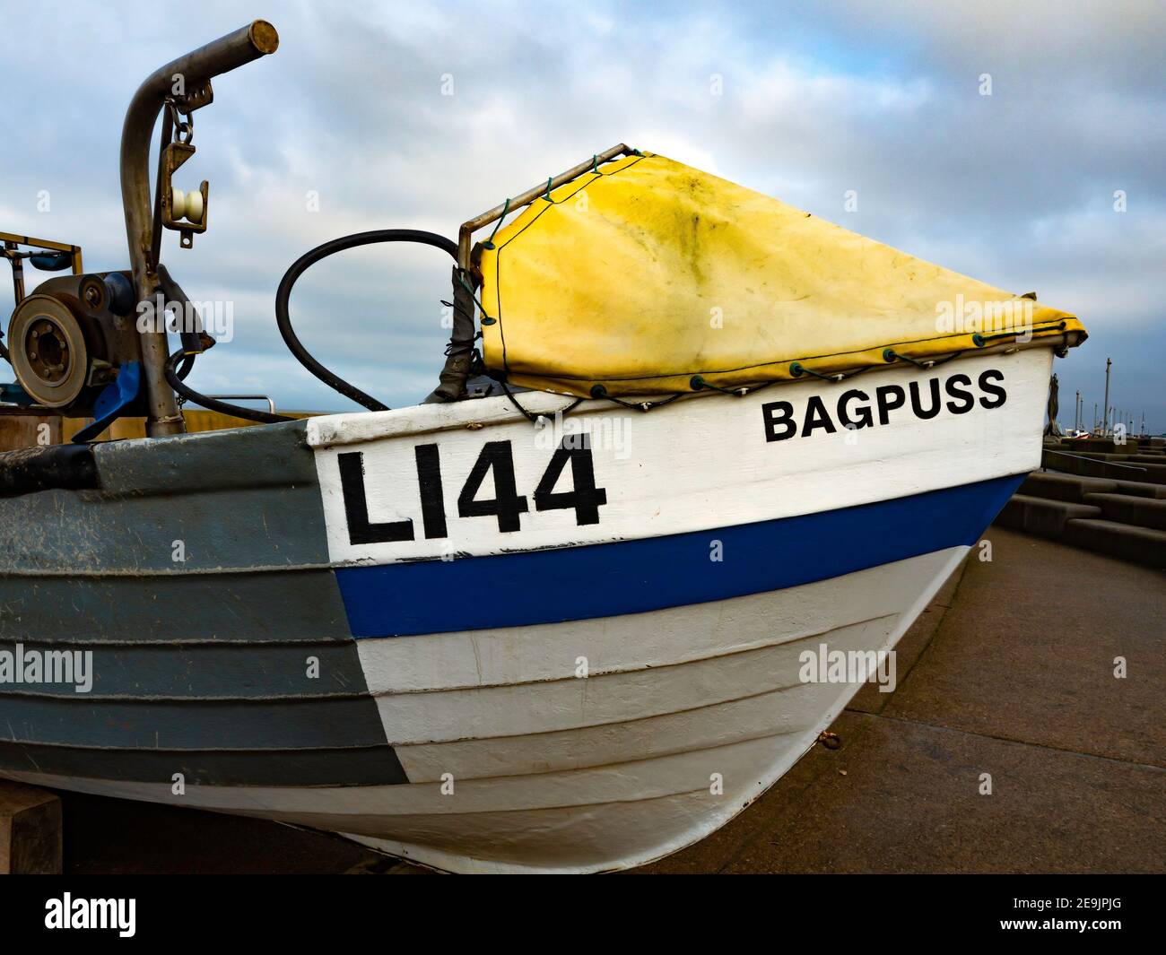 Bow detail of Bagpuss an inshore fishing boat registration L144 on the Esplanade Redcar North Yorkshire Stock Photo