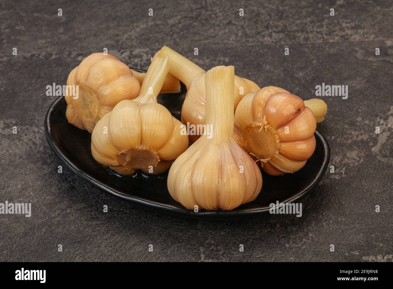 Marinated young garlic in the bowl Stock Photo Alamy