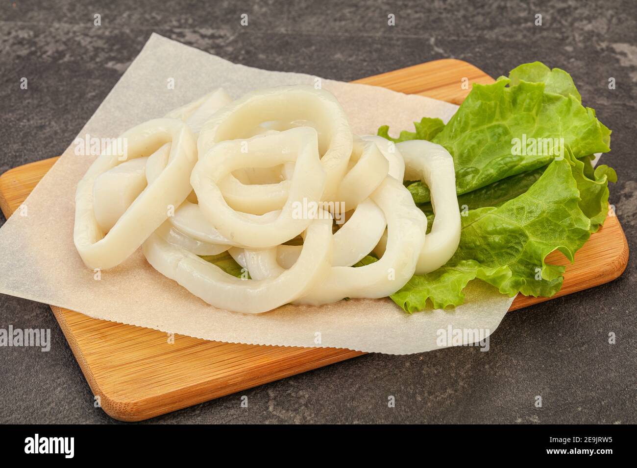 Raw squid rings ready for cooking Stock Photo - Alamy