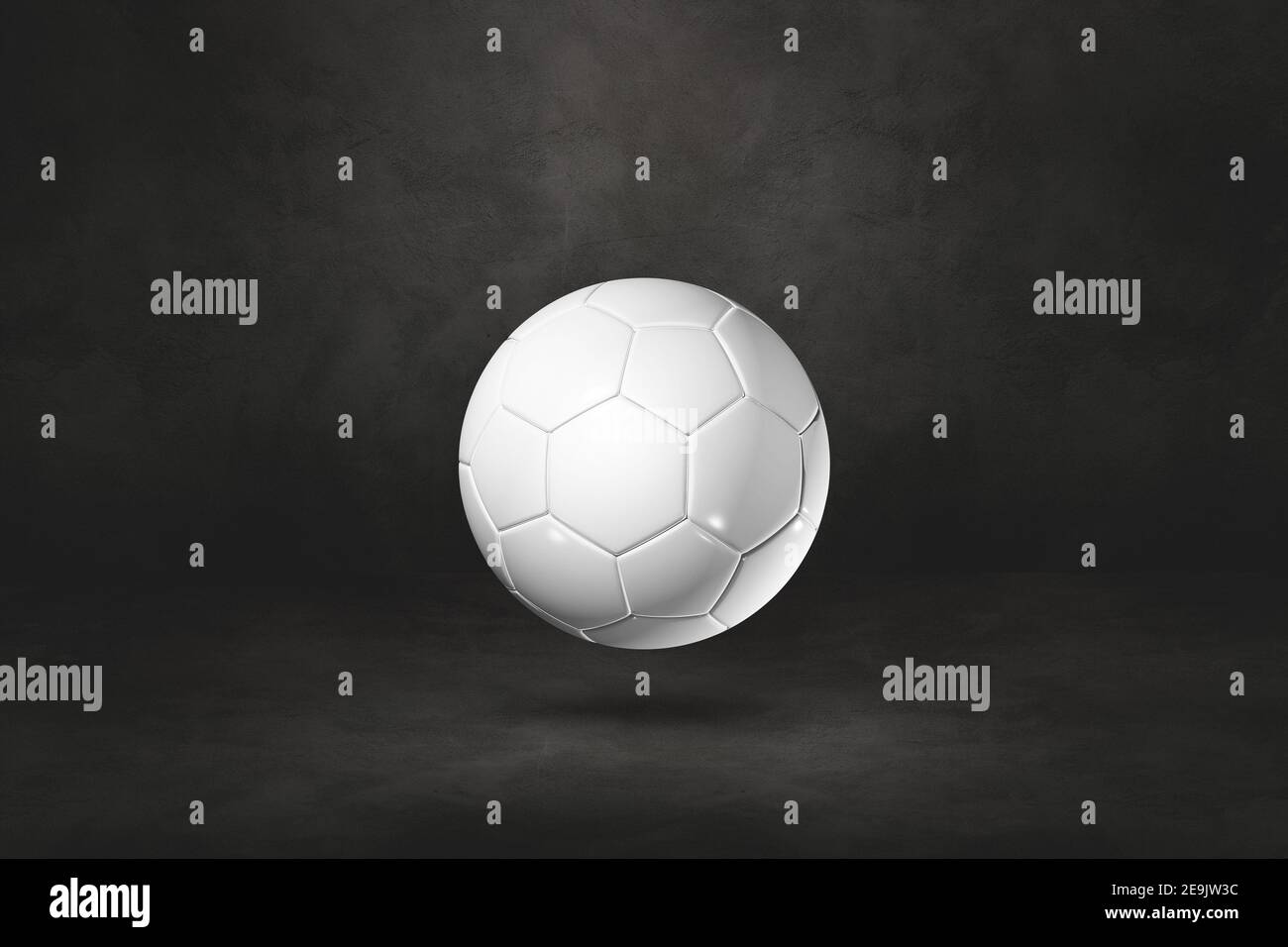 White soccer ball isolated on a black studio background. 3D ...