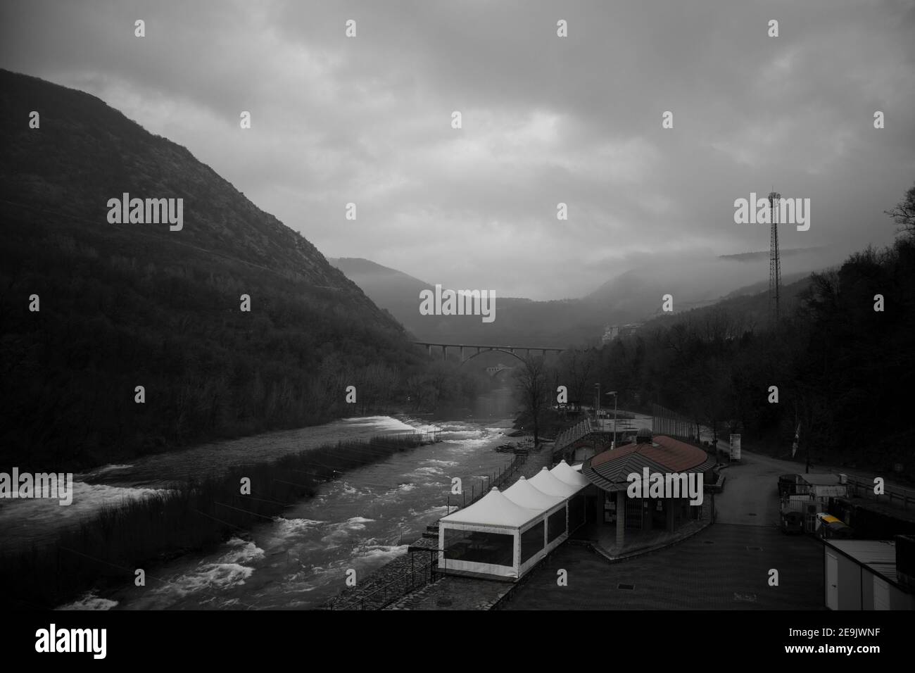 Kayak Centre in Solkan By Soca River in Bad Weather. Is not Raining But is All Wet and Depressive Grey. The Bar is Closed and Only Few People are Arou Stock Photo