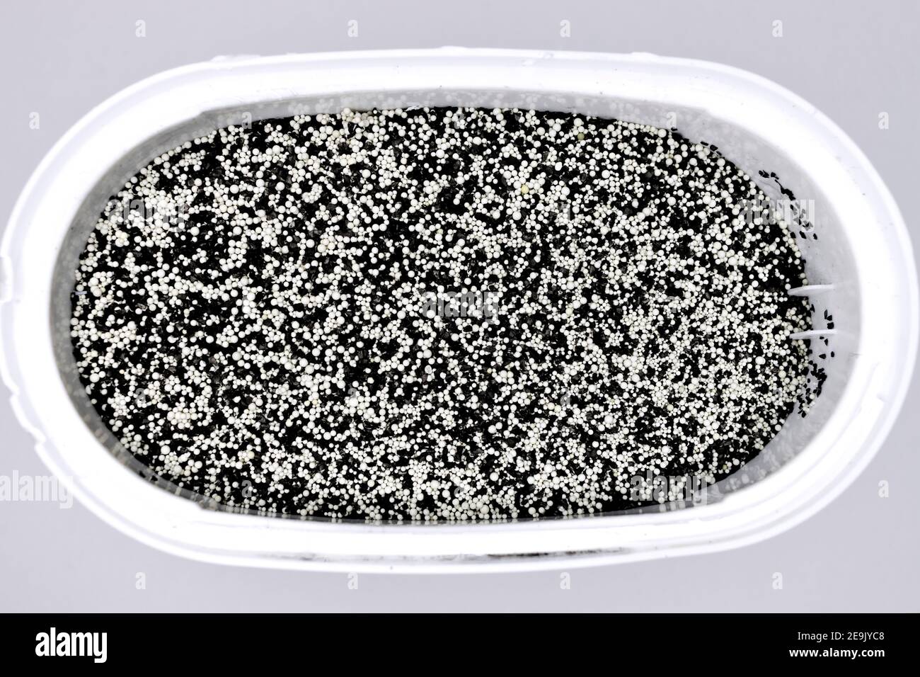 Inside of an activated charcoal water filter for domestic water