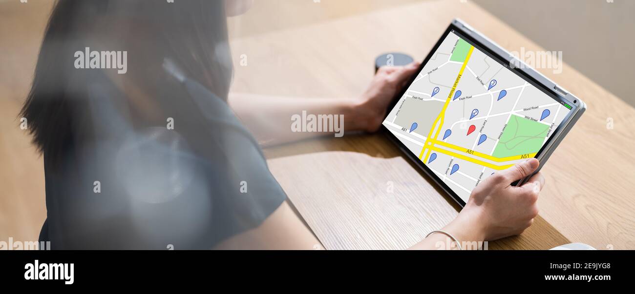 GPS Location Map Search Holding Tablet Computer Stock Photo Alamy