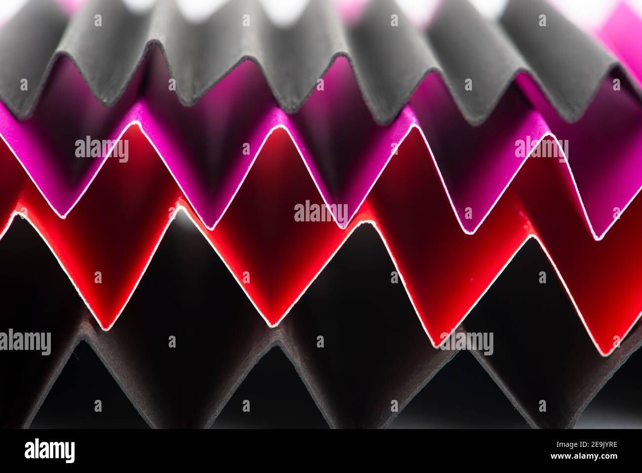 Zig Zag fold paper texture. Zigzag paper abstract background. Macro photography. Stock Photo