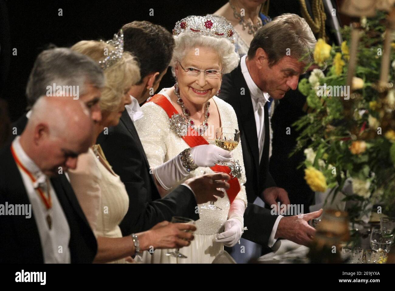 File photo dated 26/03/08 of Queen Elizabeth II, toasting with France's then President Nicolas Sarkozy at the start of a state banquet at Windsor Castle in Windsor. The Queen will have reigned as monarch for 69 years on Saturday. Stock Photo