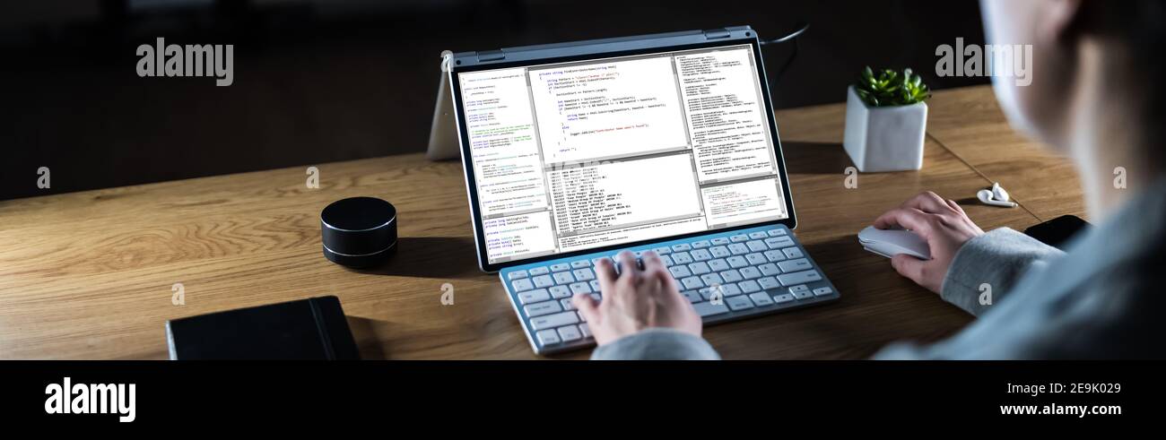 Coder Working At Night On Laptop Computer Screen Stock Photo - Alamy