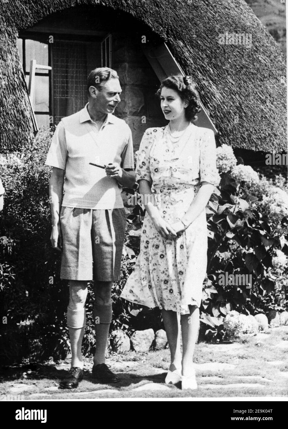 File photo dated 21/04/47 of King George VI relaxing with his daughter Princess Elizabeth during a visit to Natal National Park in South Africa. The Queen is set to enter the milestone 70th year of her reign, as she prepares to mark the anniversary of her accession away from Sandringham for the first time in more than 30 years. Issue date: Friday February 5, 2021. Stock Photo