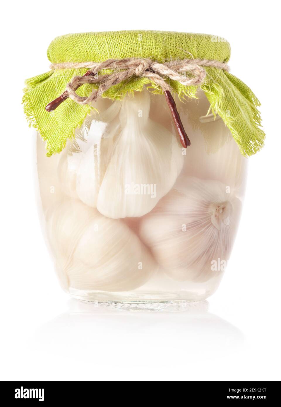 Canned garlic in glass jar isolated on white background Stock Photo Alamy