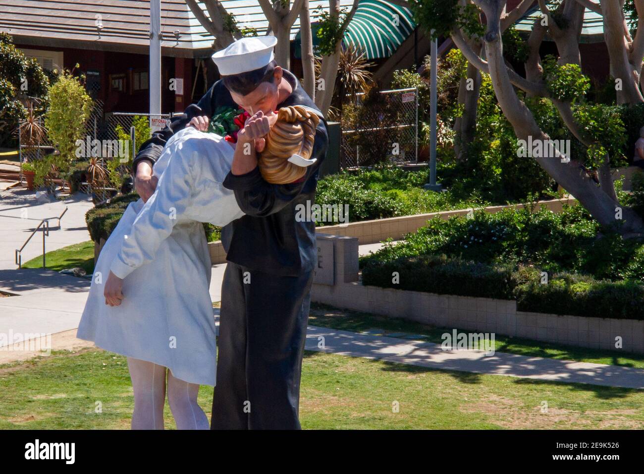 Giant Sailor Statue "Embracing Peace" in front of USS Midway Maritime