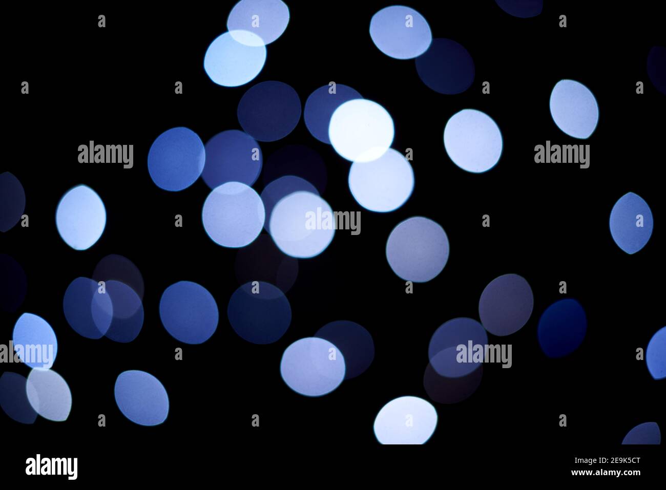 Blue night bokeh as a background. Stock Photo