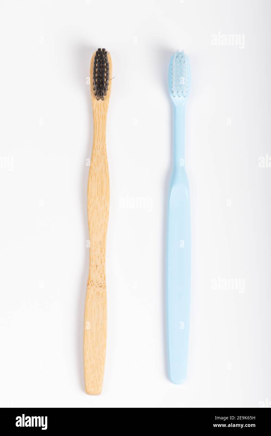 Bamboo toothbrush on white background Stock Photo
