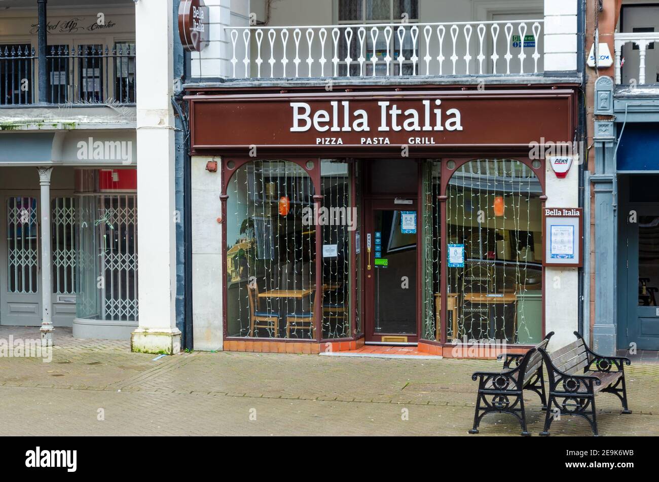 Chester; UK: Jan 29, 2021: The Bella Italia restaurant on Eastgate Street is temporarily closed during the pandemic. Stock Photo