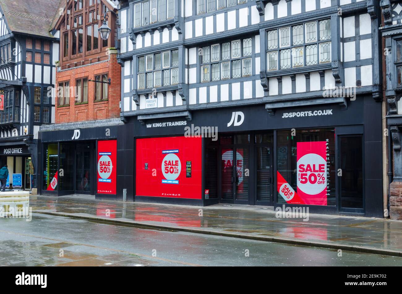 Chester; UK: Jan 29, 2021: The J D Sports store on Foregate Street is having a sale with reductions up to half price. Stock Photo