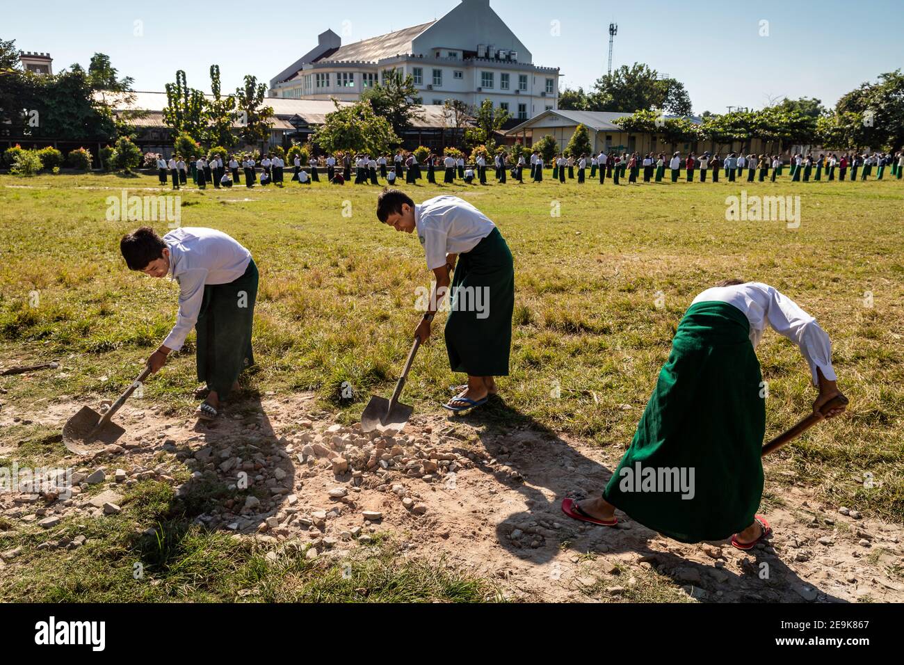 The orphans living in the Shatapru Education Boarder orphanage in Myikyina in Northern Myanmar attend classes in the government school. Stock Photo