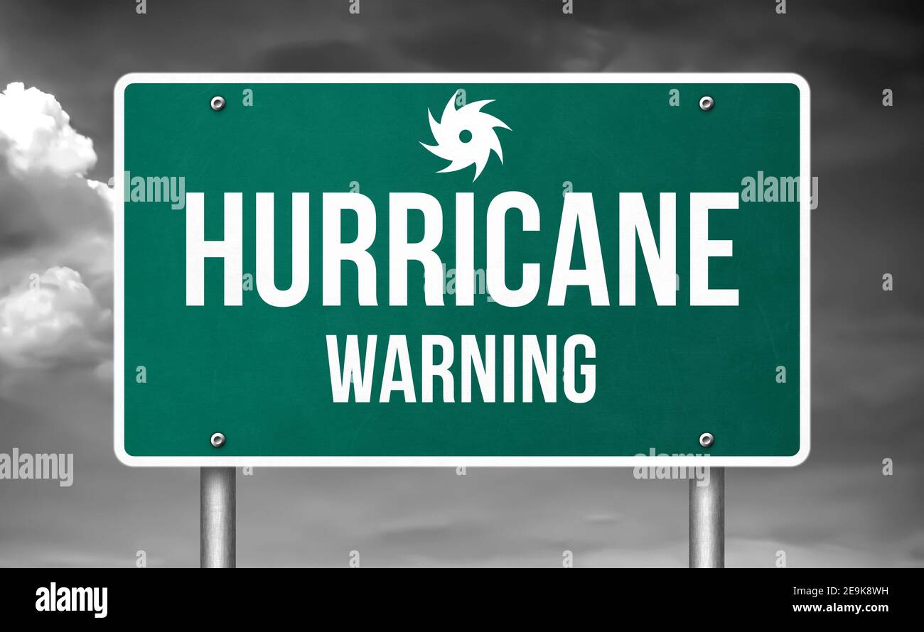 Hurricane warning road sign message Stock Photo Alamy