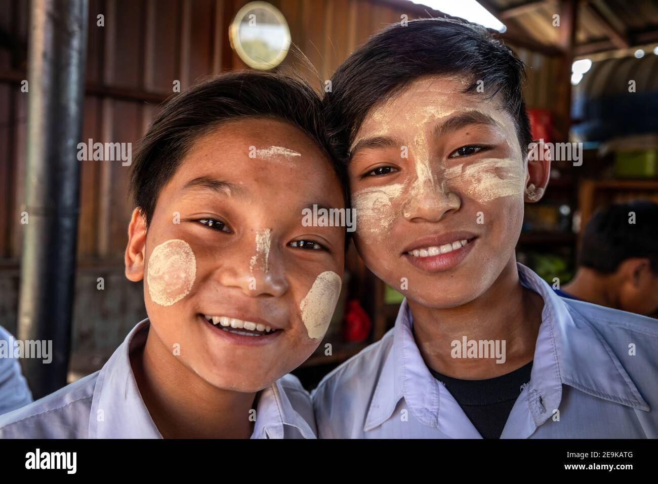 The students, most of whom are orphans who fled the civil war, come to their Chinpwi Education Boarding School in Myikyina, Myanmar, during their lunch break. Stock Photo