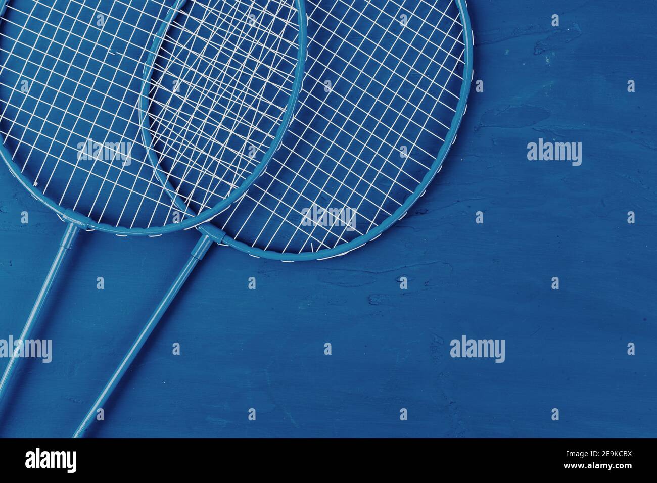 Badminton Racket Bottom View Badminton rackets on classic blue background, top view Stock Photo - Alamy