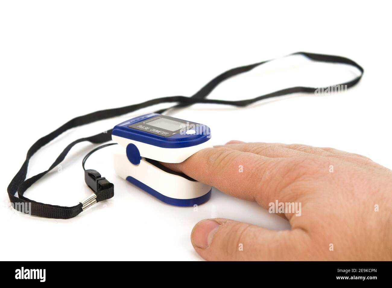 Pulse oximeter used to measure pulse rate and oxygen levels Stock Photo