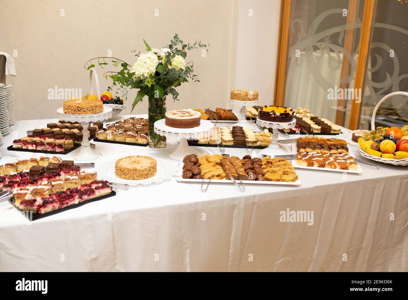 Snacks and dessert on a wedding reception table Stock Photo - Alamy