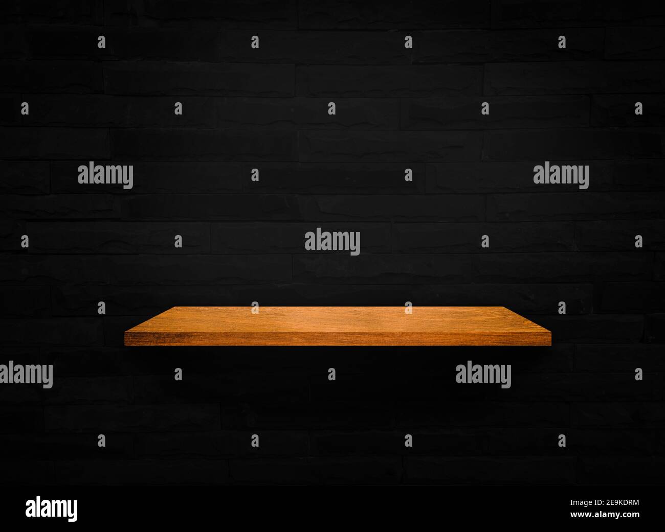 Wooden shelves on black brick wall texture background with clipping