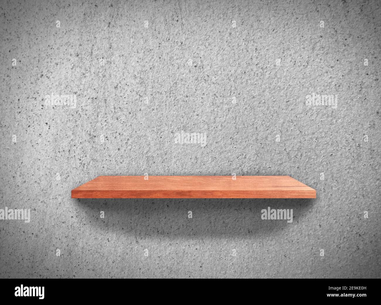 Top view of wood shelves on concrete wall texture background with