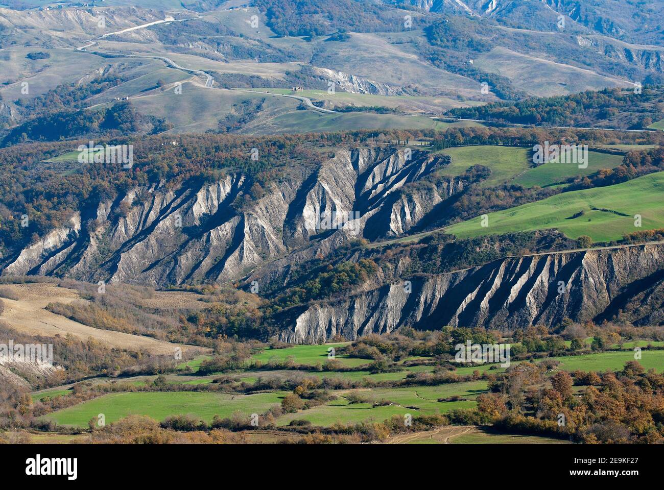 Landscape with badlands (calanchi) in Val d'Orcia, Tuscany, Italy Stock Photo