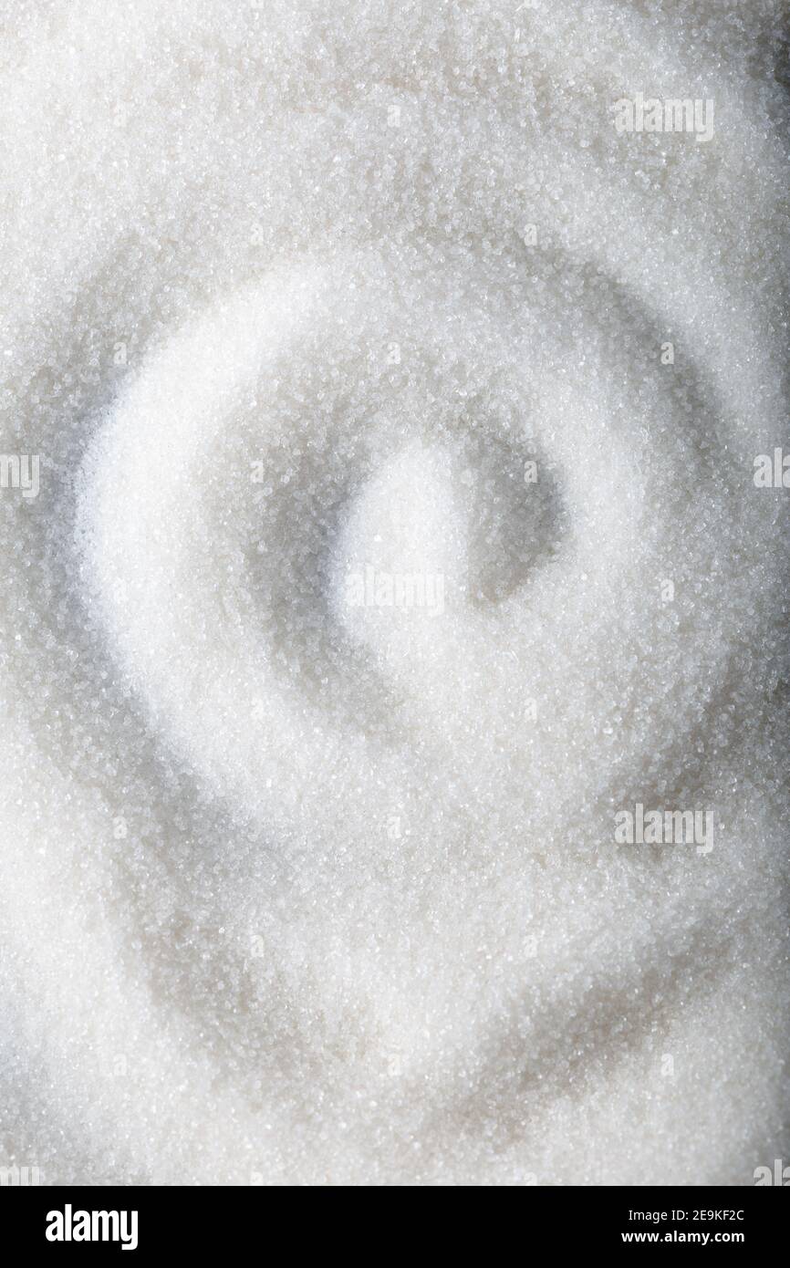 Pure refined sugar. Granulated white sugar. Background and texture