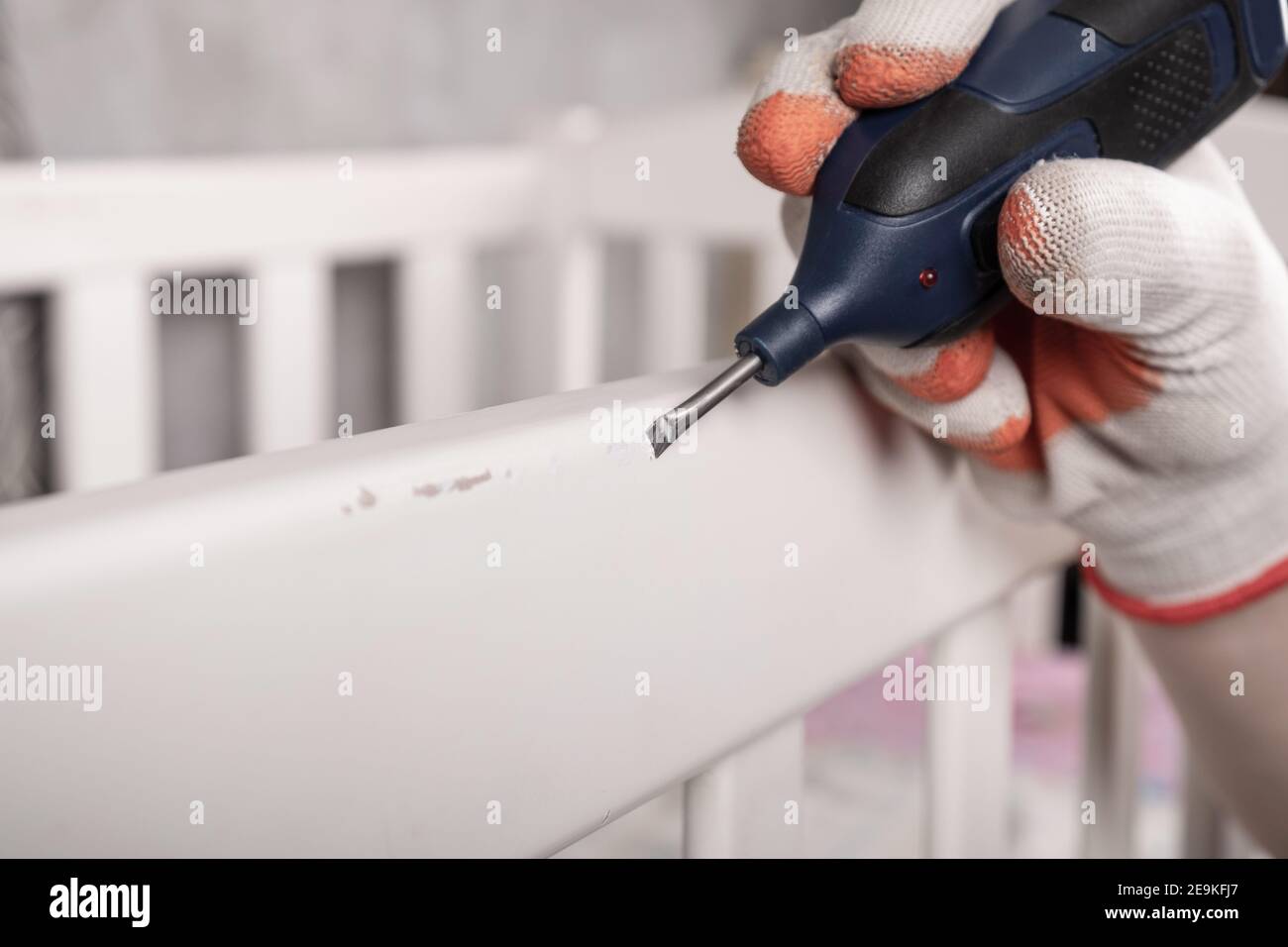 sealing damage with wax, restoration wood furniture Stock Photo Alamy