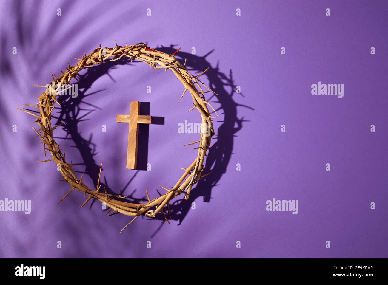 Lent season, Holy week and Good friday concept. Crown of torns and cross on  purple background Stock Photo - Alamy