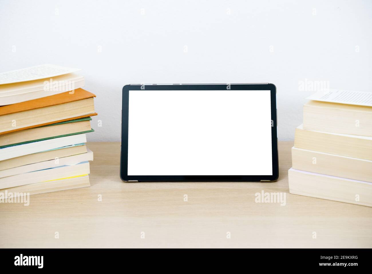 Tablet mockup and white screen on a table Stock Photo