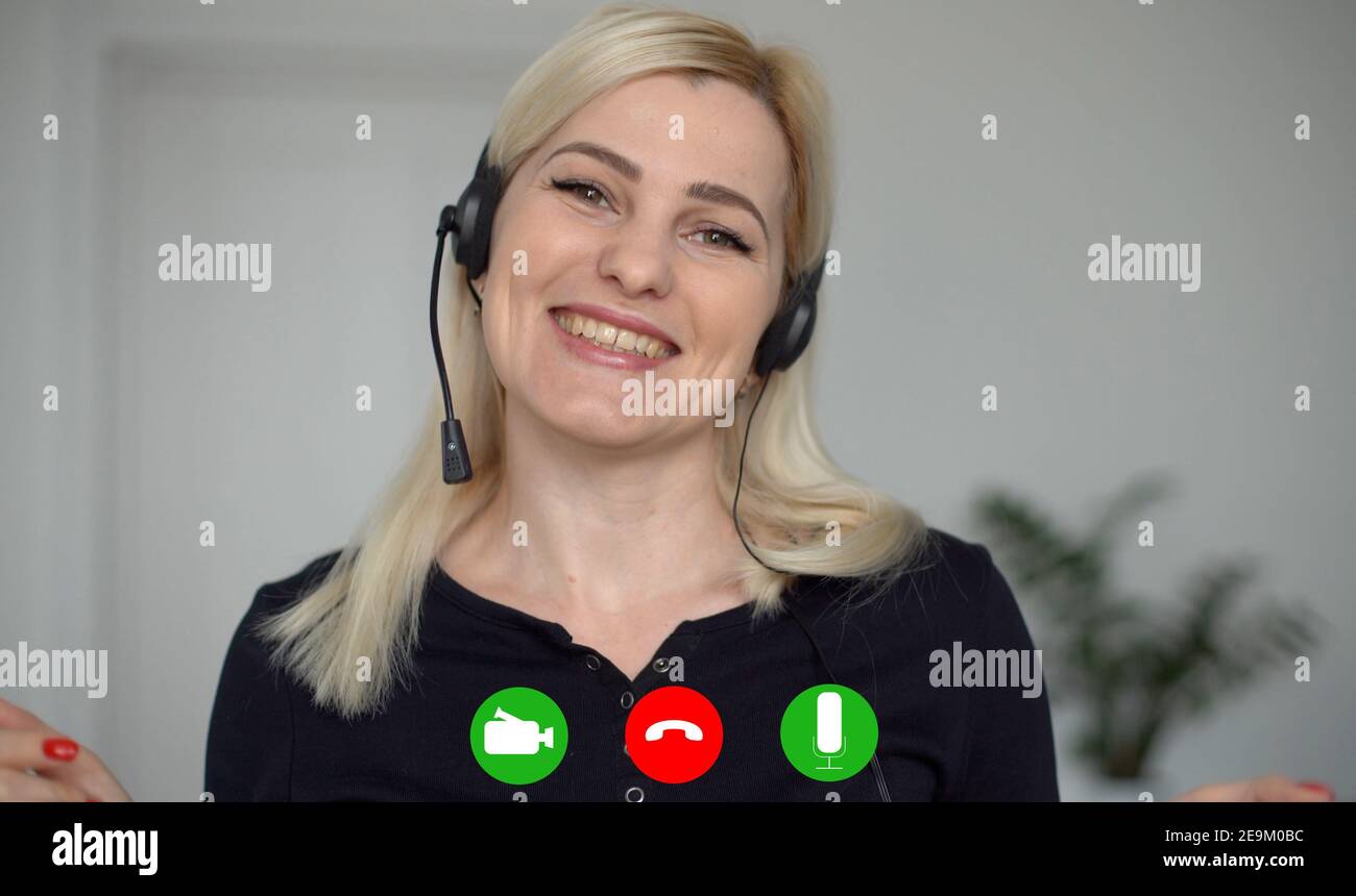 Pc screen view, head shot portrait businesswoman makes videocall looks at webcam consult client distantly, confident business lady lead job interview Stock Photo