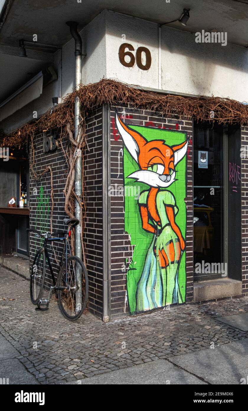 Lois cafe exterior and Dared pasteup of fox at at Linienstraße 60,Mitte,Berlin,Germany Stock Photo