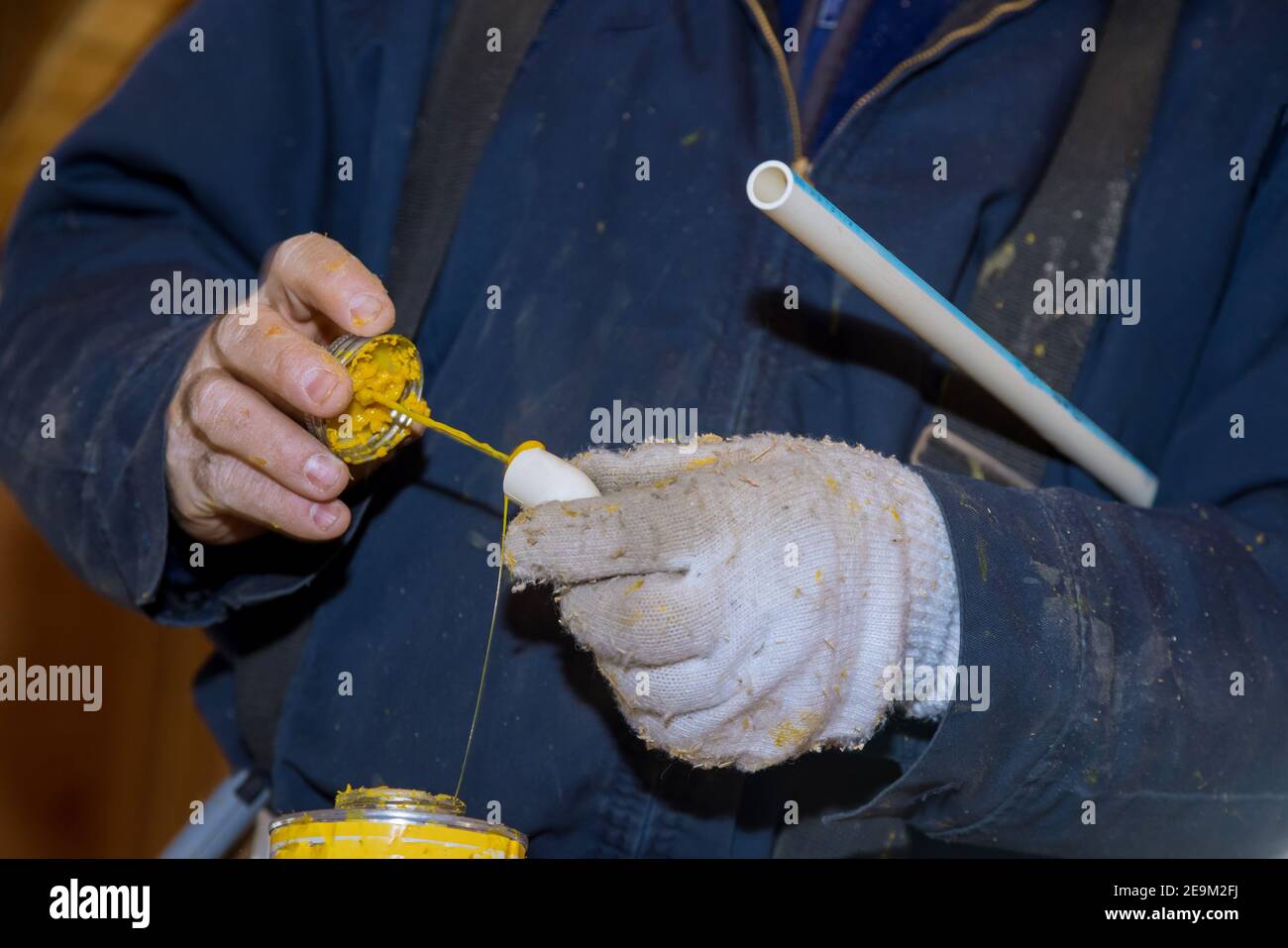 Prepare a pipe joint with glue sealing water line PVC pipes on new home